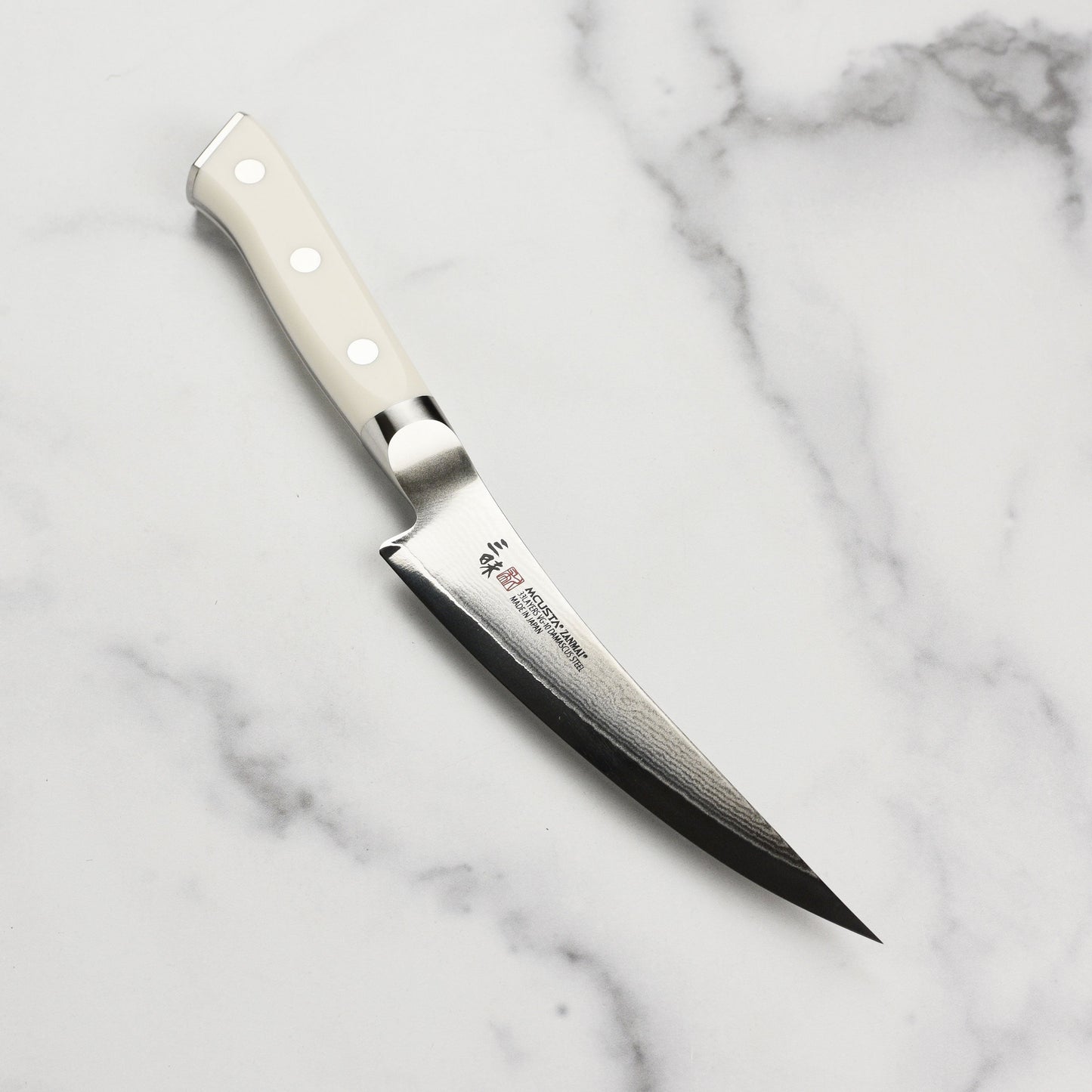 Zanmai Classic Damascus Corian 6.5" Curved Boning Knife