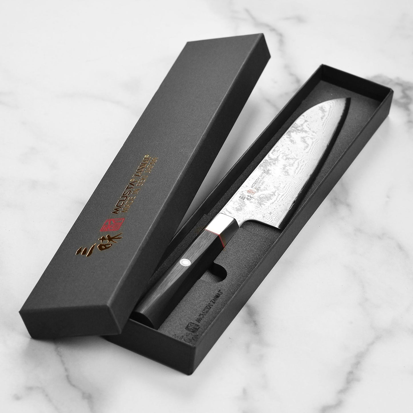 Zanmai Hybrid Damascus Splash 7" Santoku