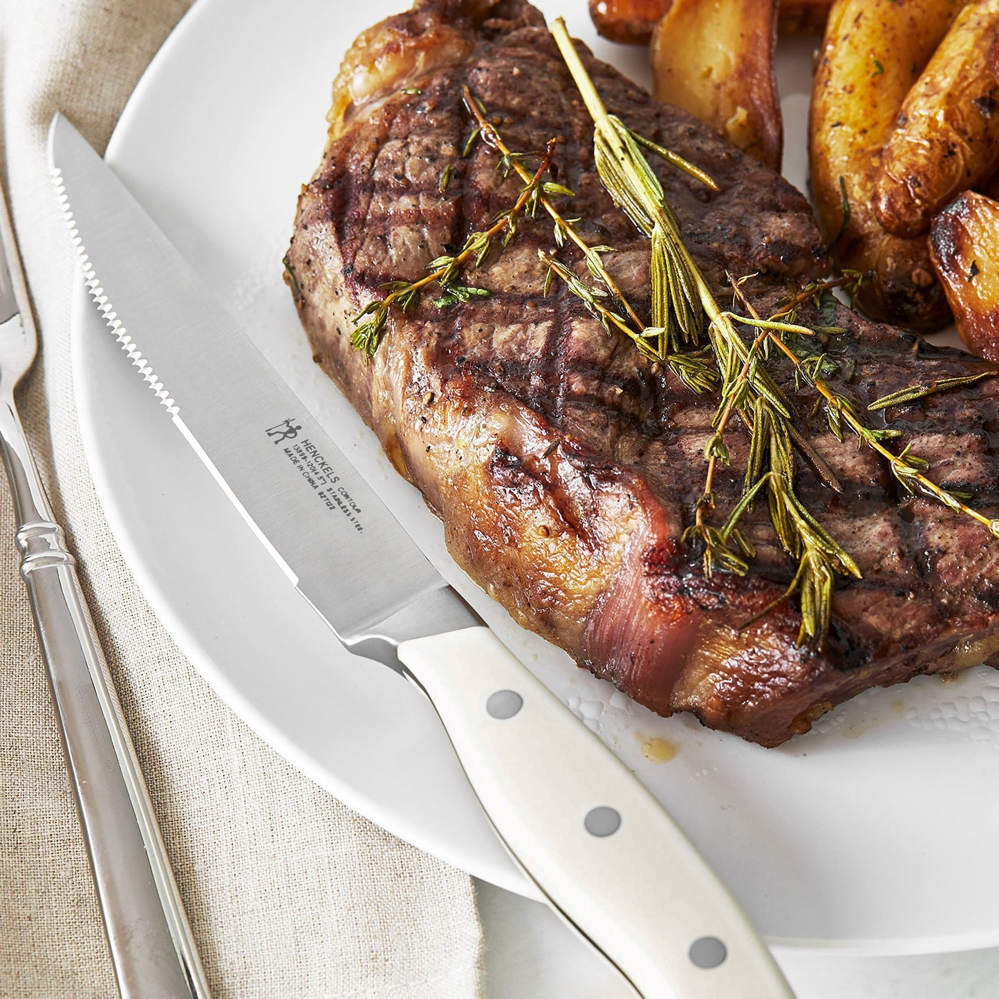 Henckels 8 Piece Forged Serrated Steak Knife Set with Gift Box, Off-White Handles