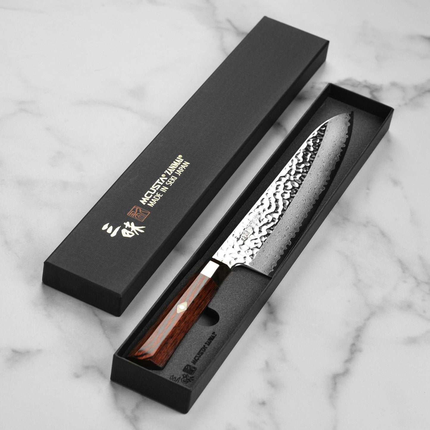 Zanmai Supreme Hammered 9.4" Gyuto