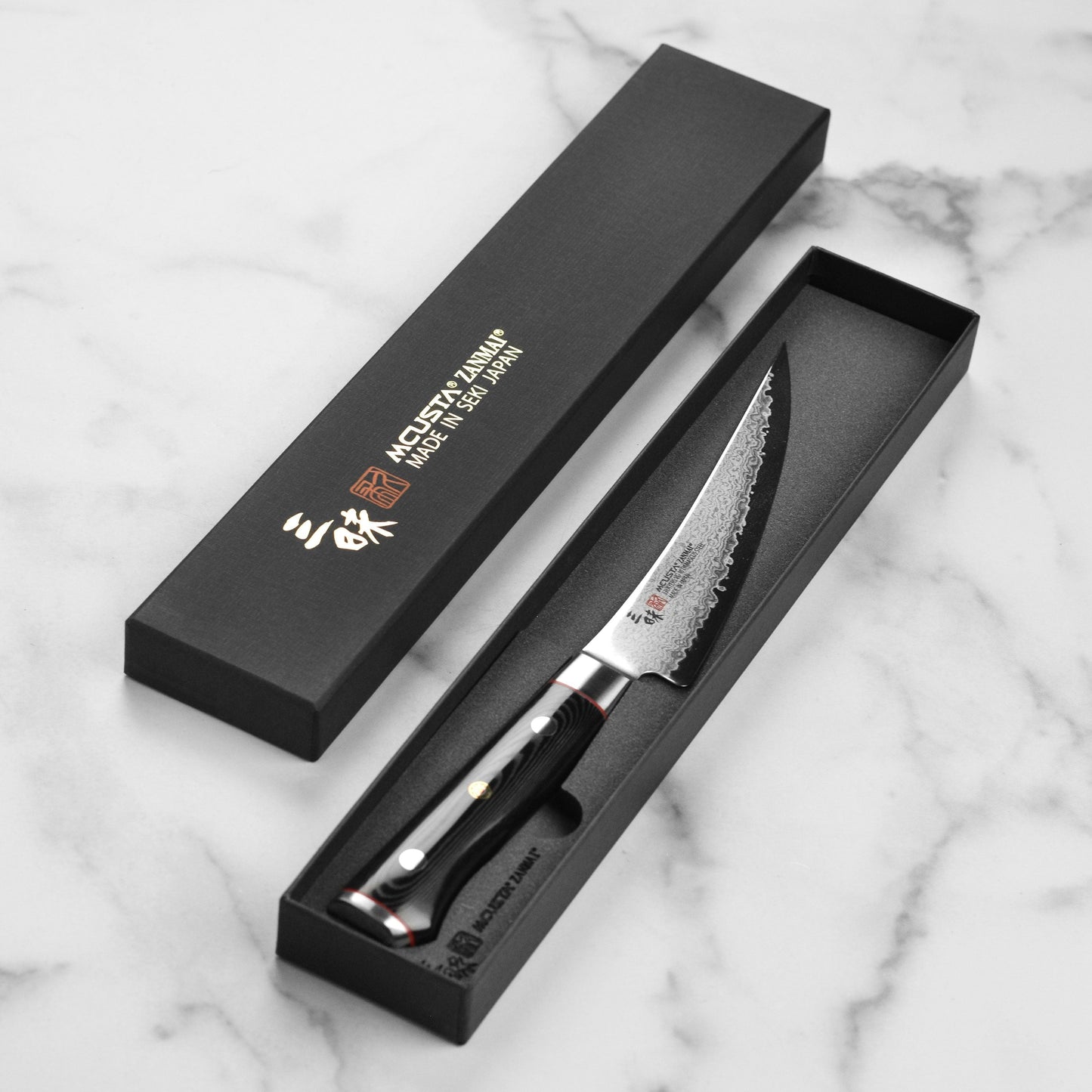 Zanmai Classic Pro Zebra Damascus 6.5" Curved Boning Knife